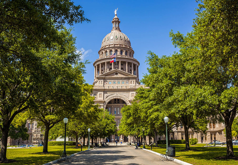 front of capitol building in austin, tx during the day