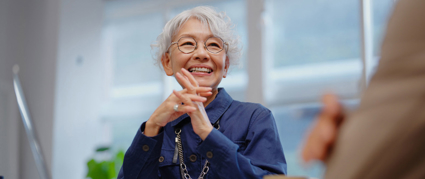 senior woman at a meeting