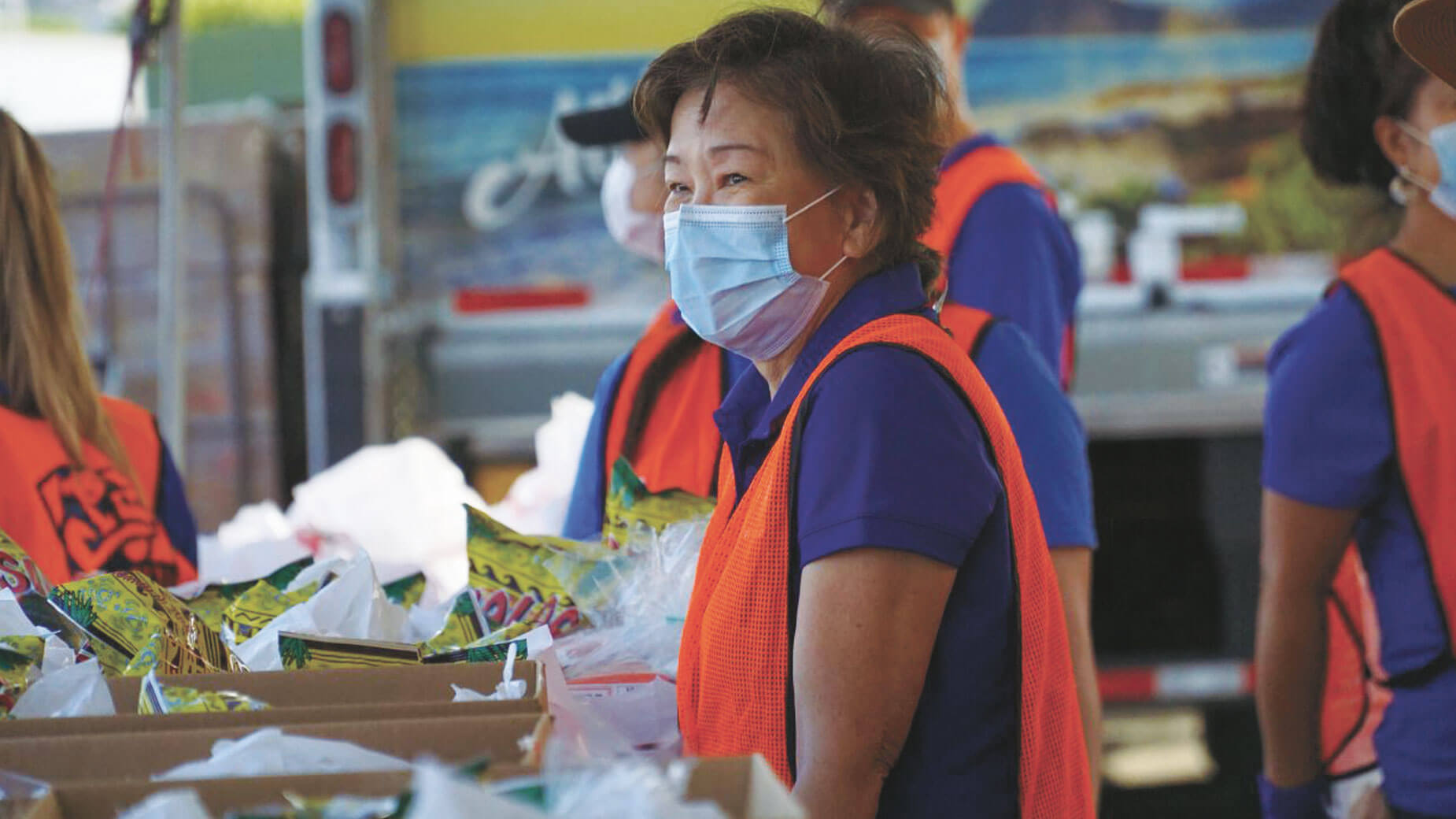 woman volunteering at food distribution