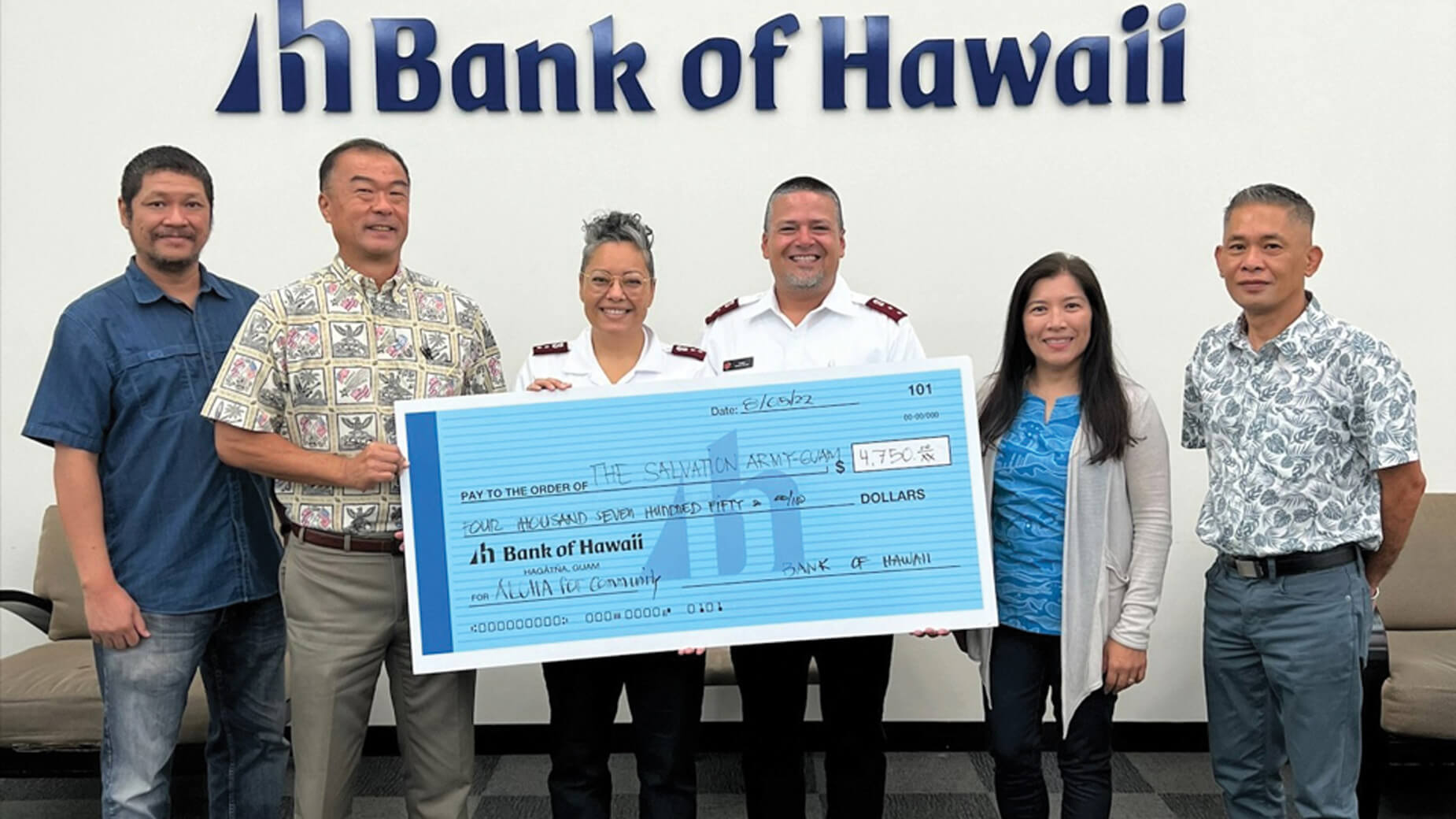 check presentation to Salvation Army Guam