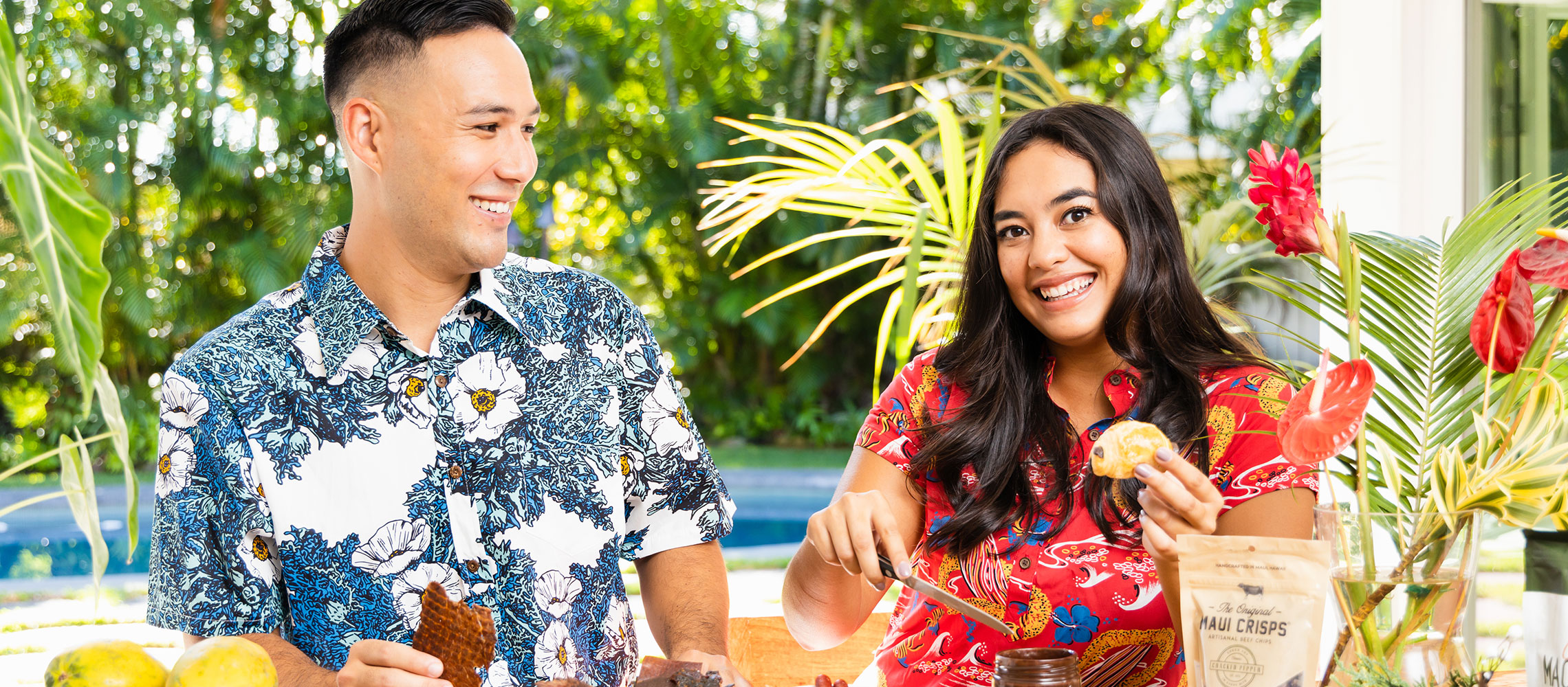 Couple displaying edible gifts