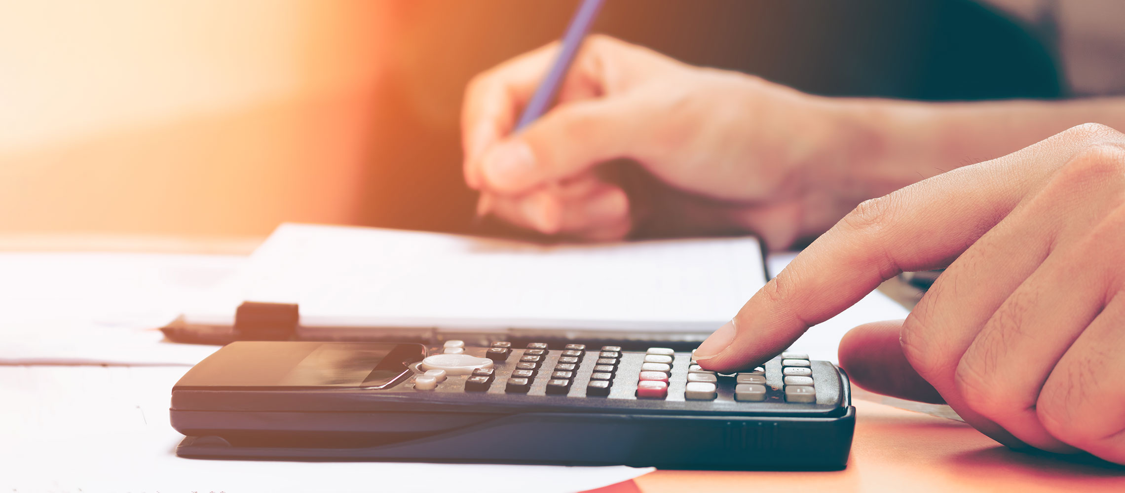 Woman calculating taxes for her HELOC