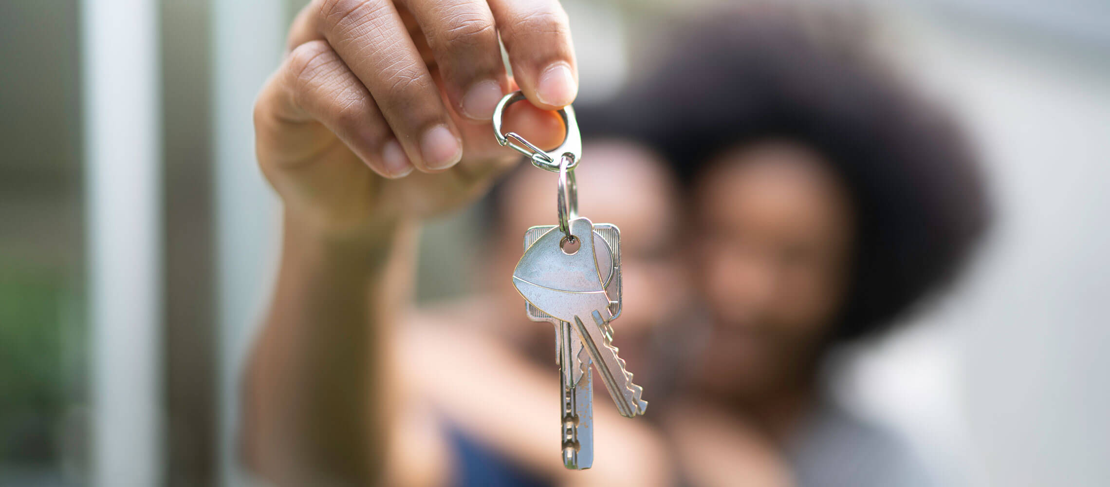 person holding keys