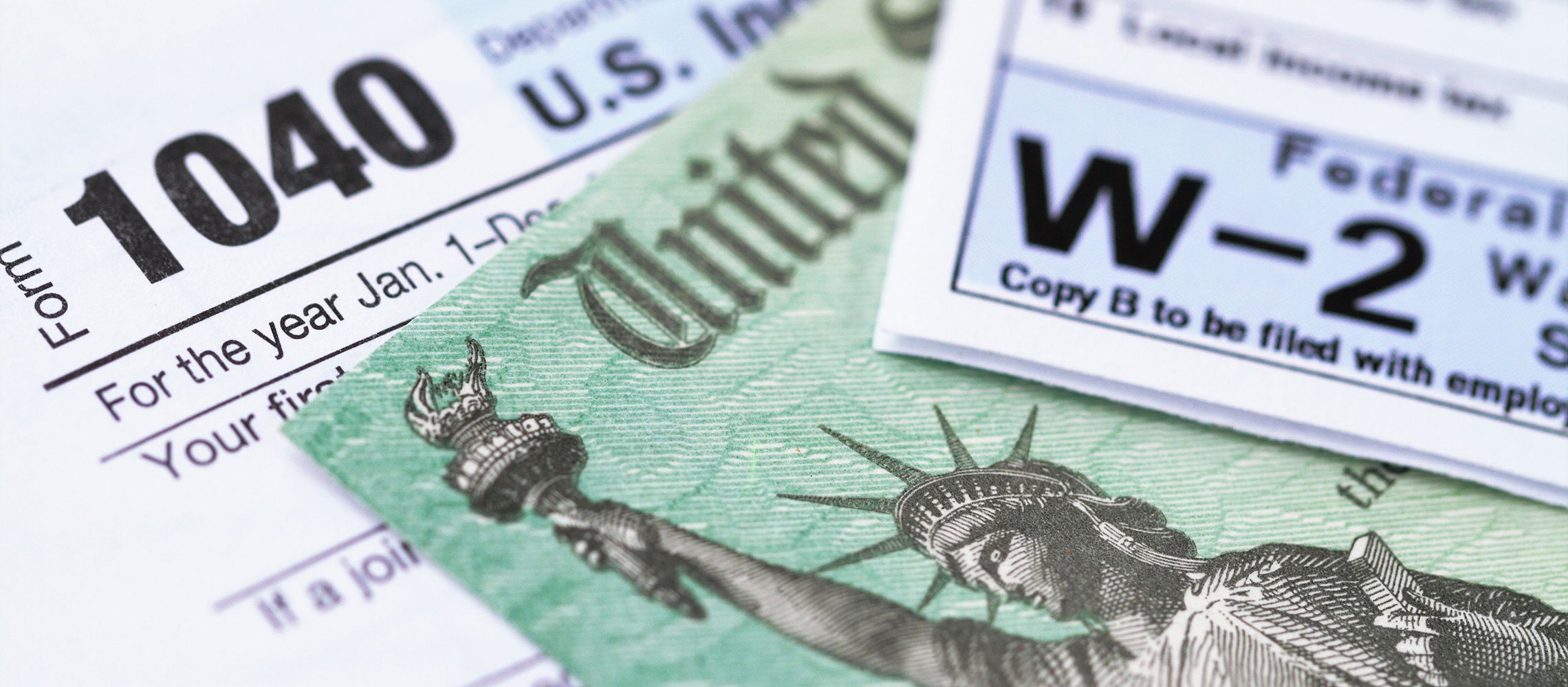 photo of W-2 form and 1040 tax form
