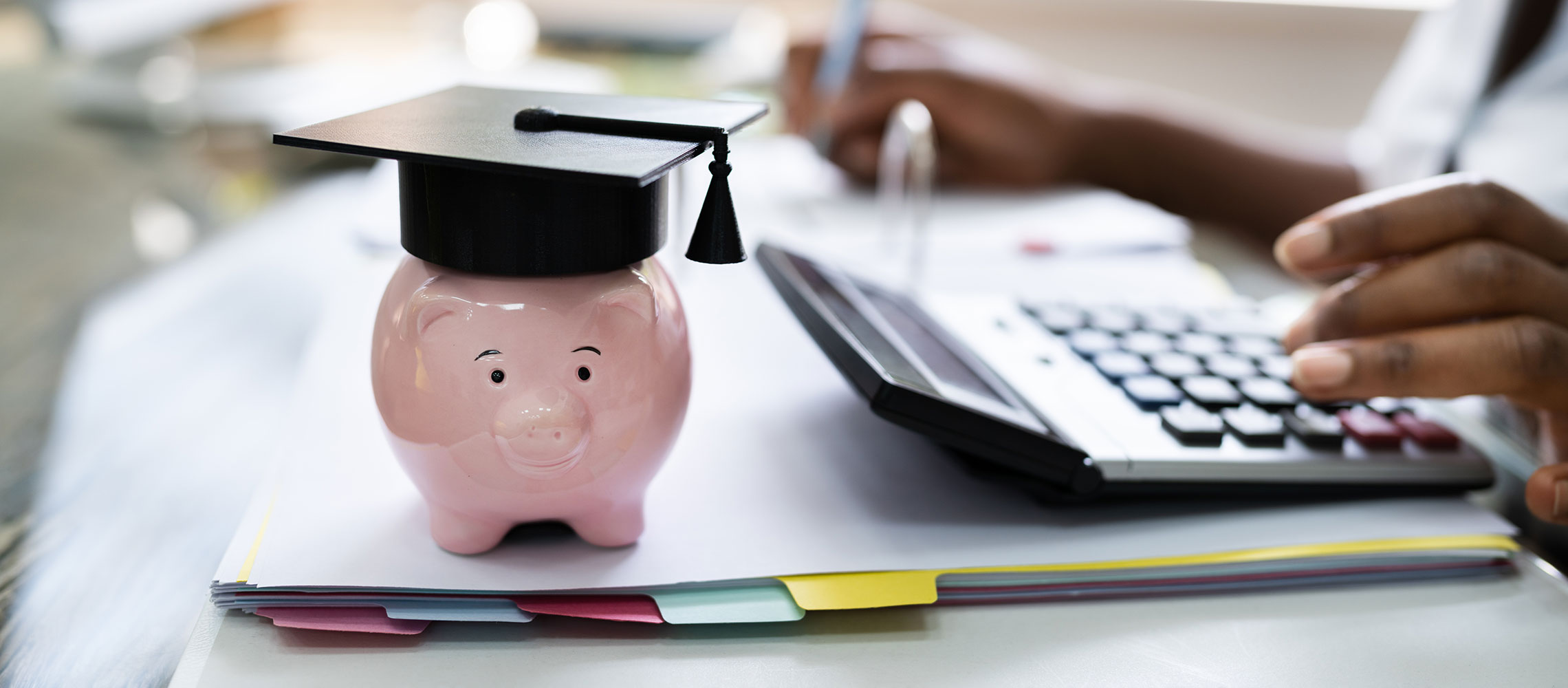 piggy bank with graduation cap