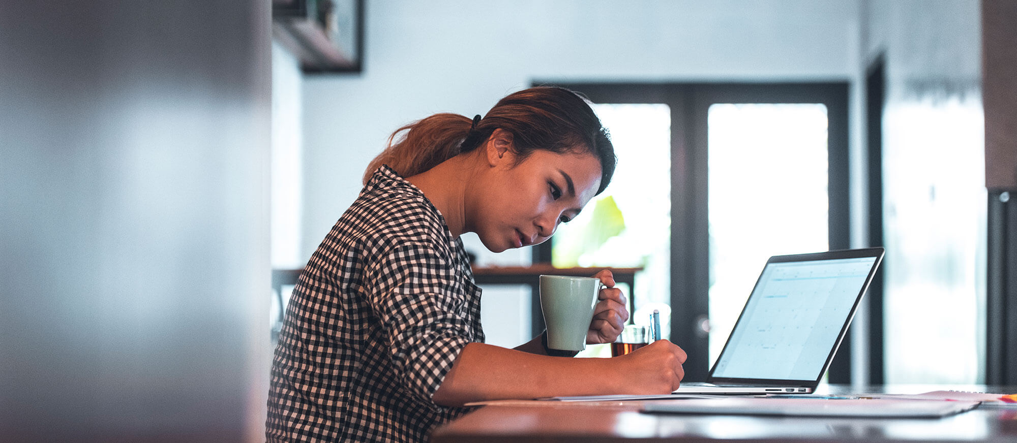 woman working on her laptop