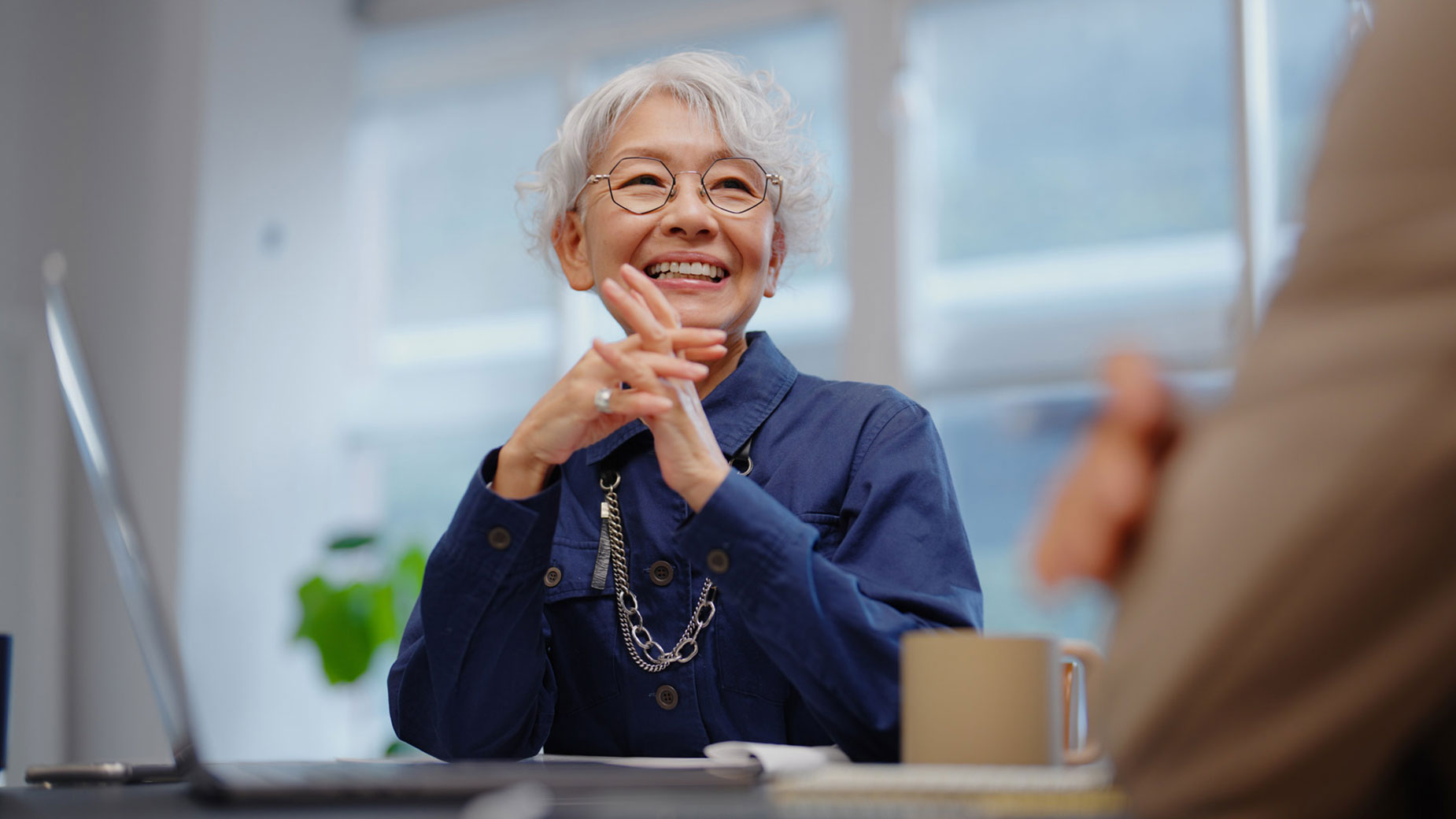 senior woman at a meeting
