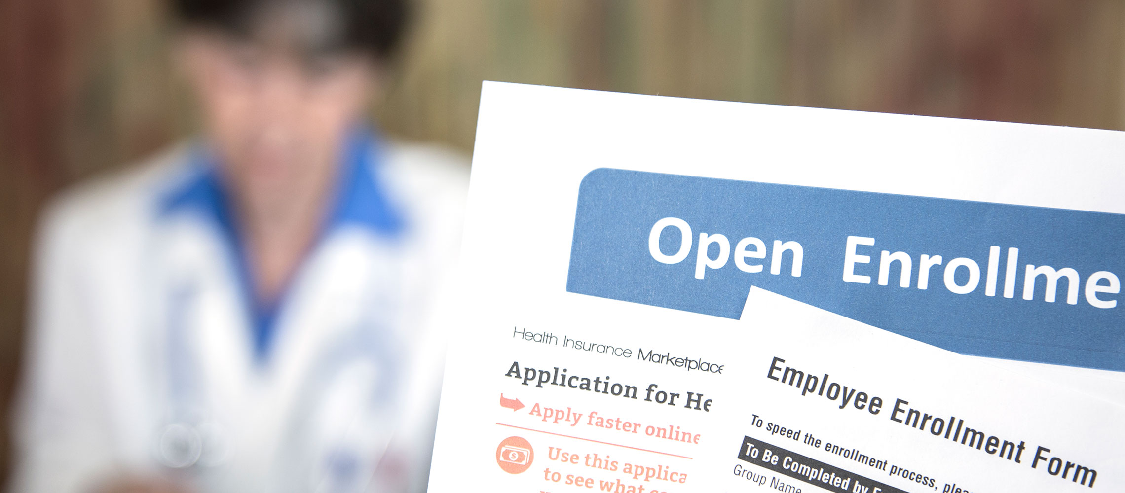 closeup of open enrollment forms