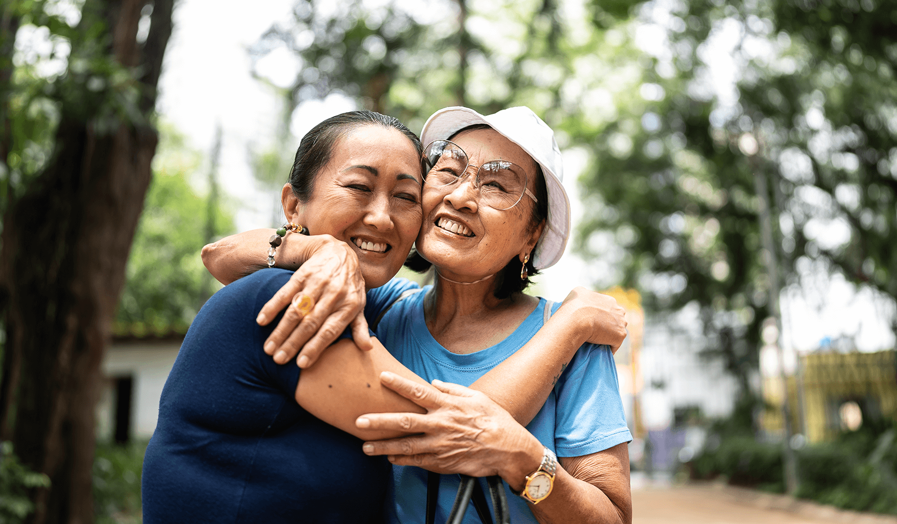 woman and mom hugging outside
