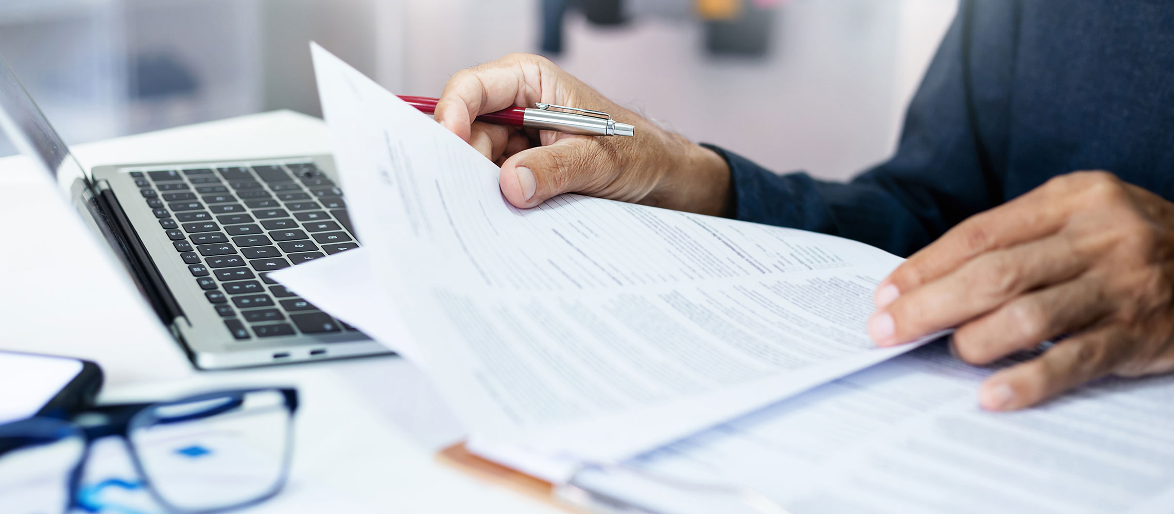 man filling out paperwork