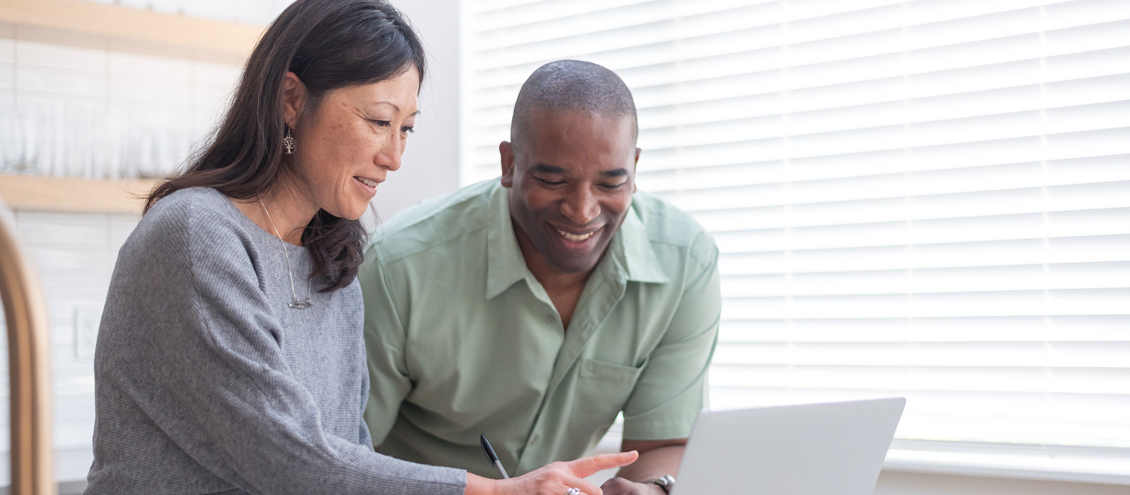 couple looking at laptop