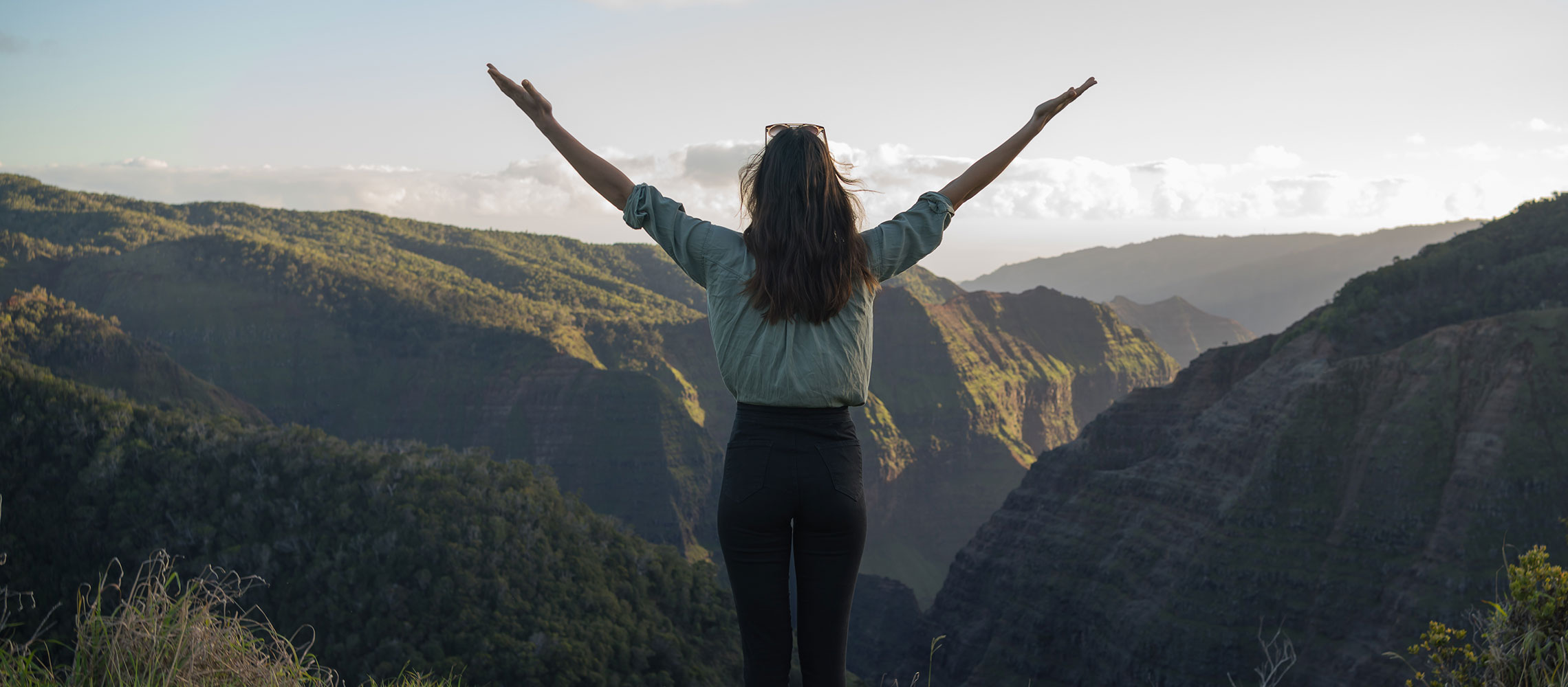 women looking over mountain valley