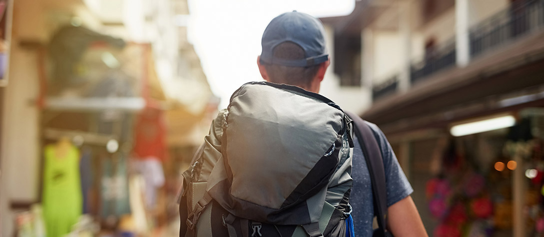 person walking with backpack