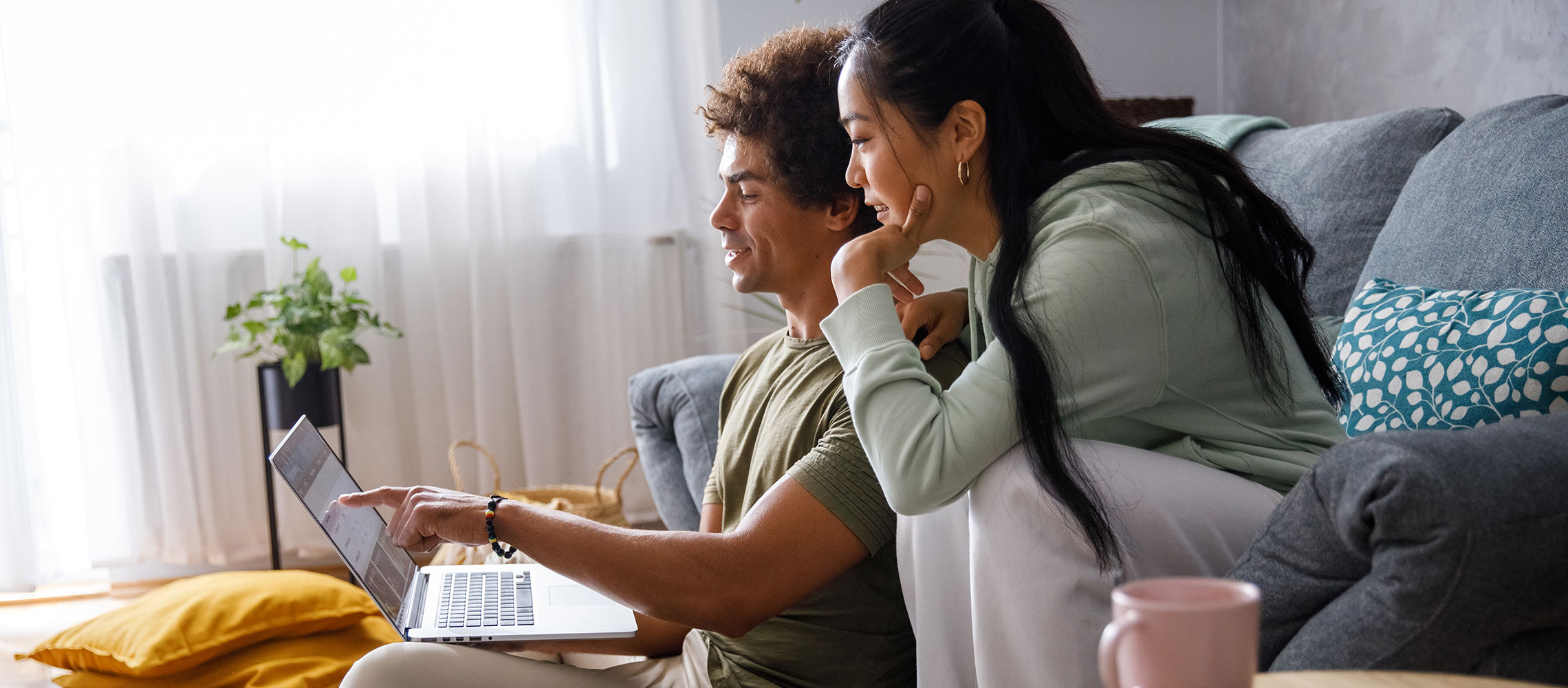 couple looking at a laptop