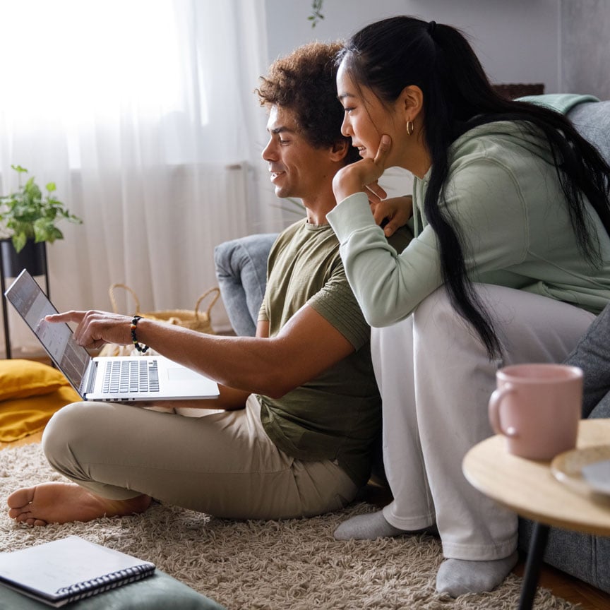 couple looking at a laptop