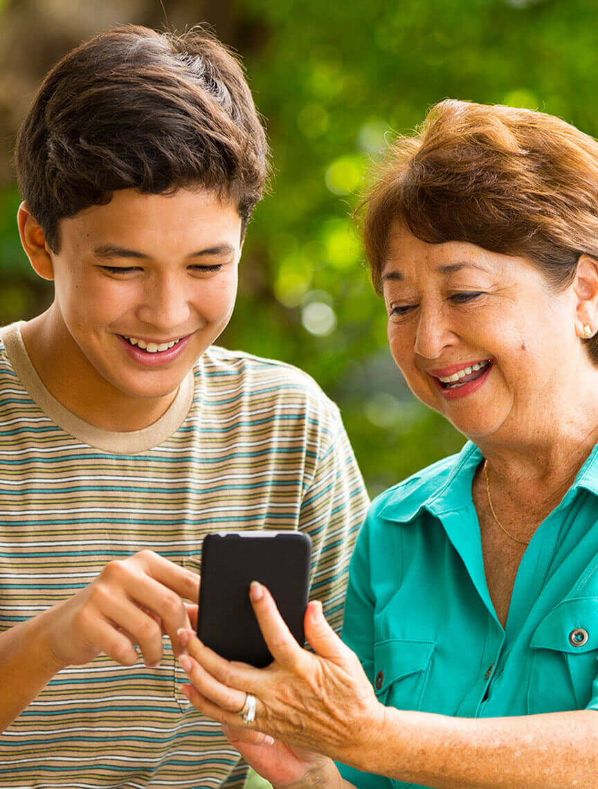 Grandma and Grandson on mobile device