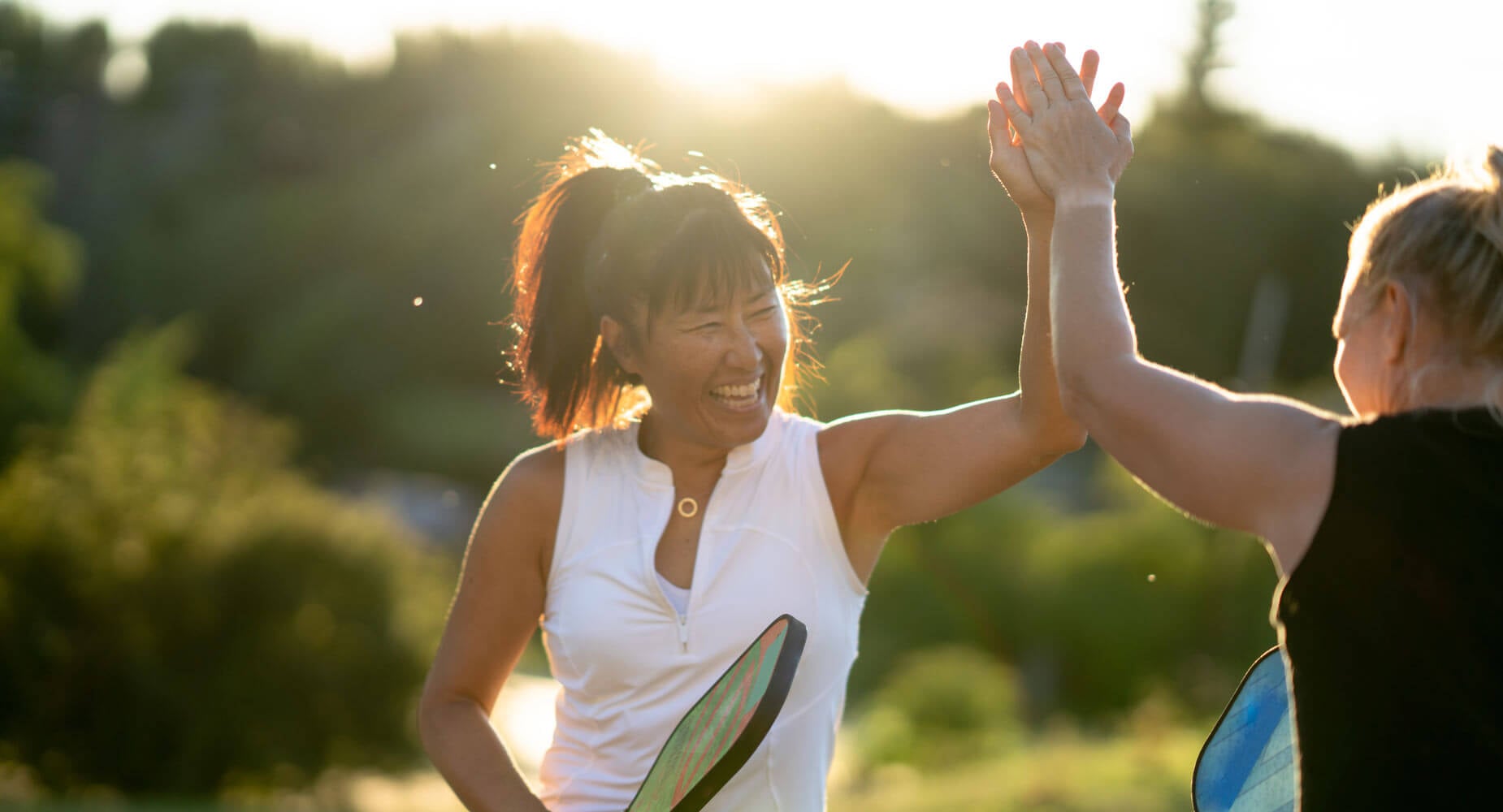 Woman at pickleball court
