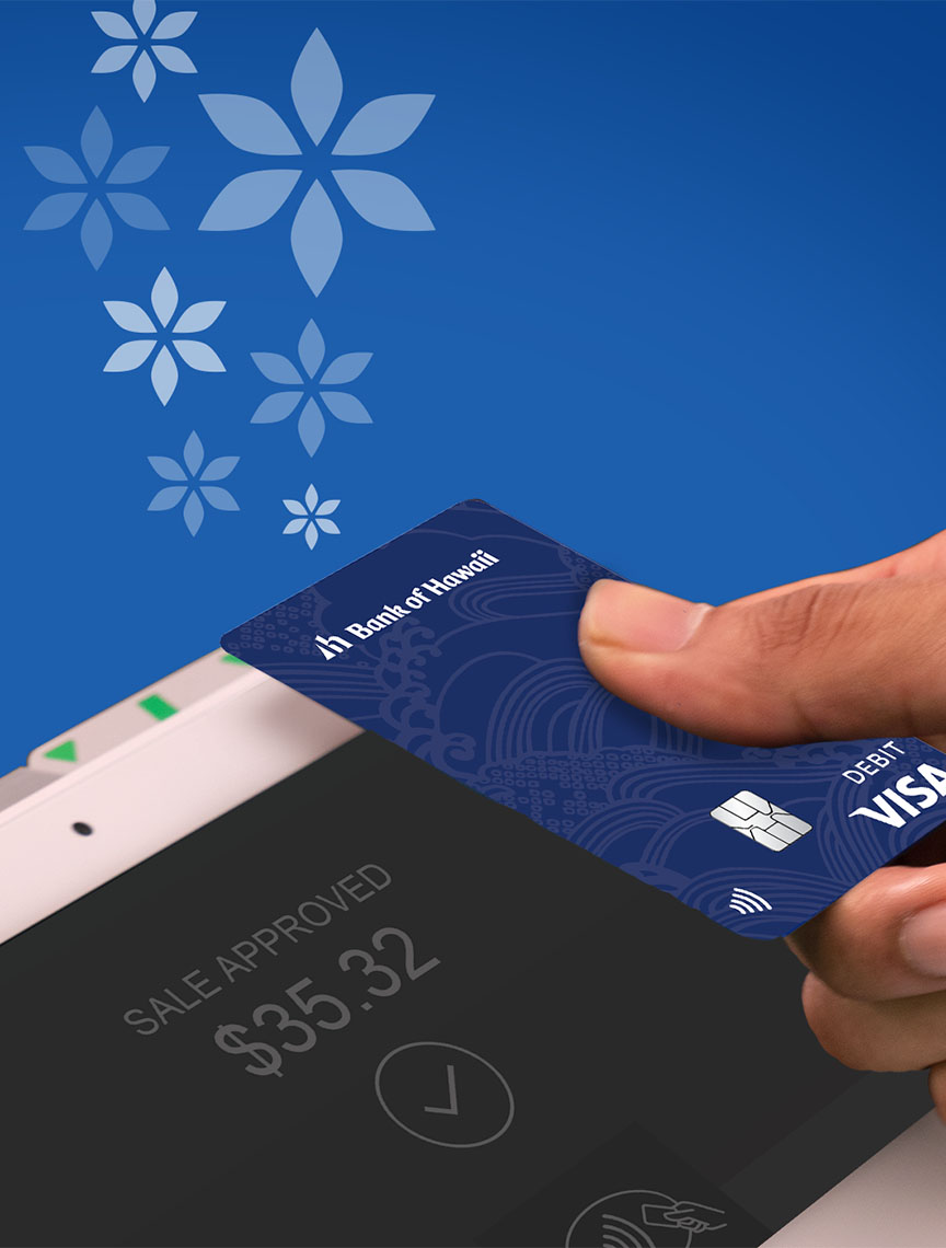 Debit card being used contactlessly over a card reader