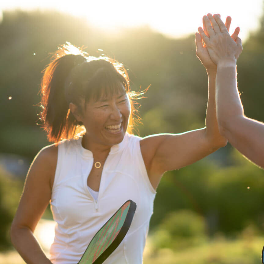Woman at pickleball court