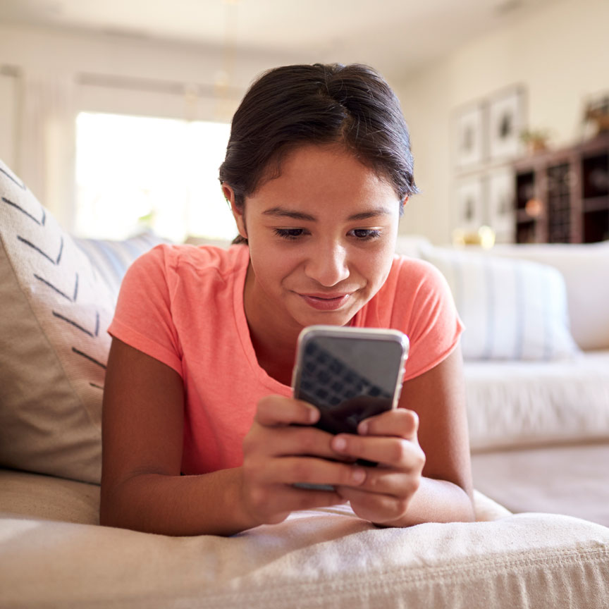 girl looking at smart phone