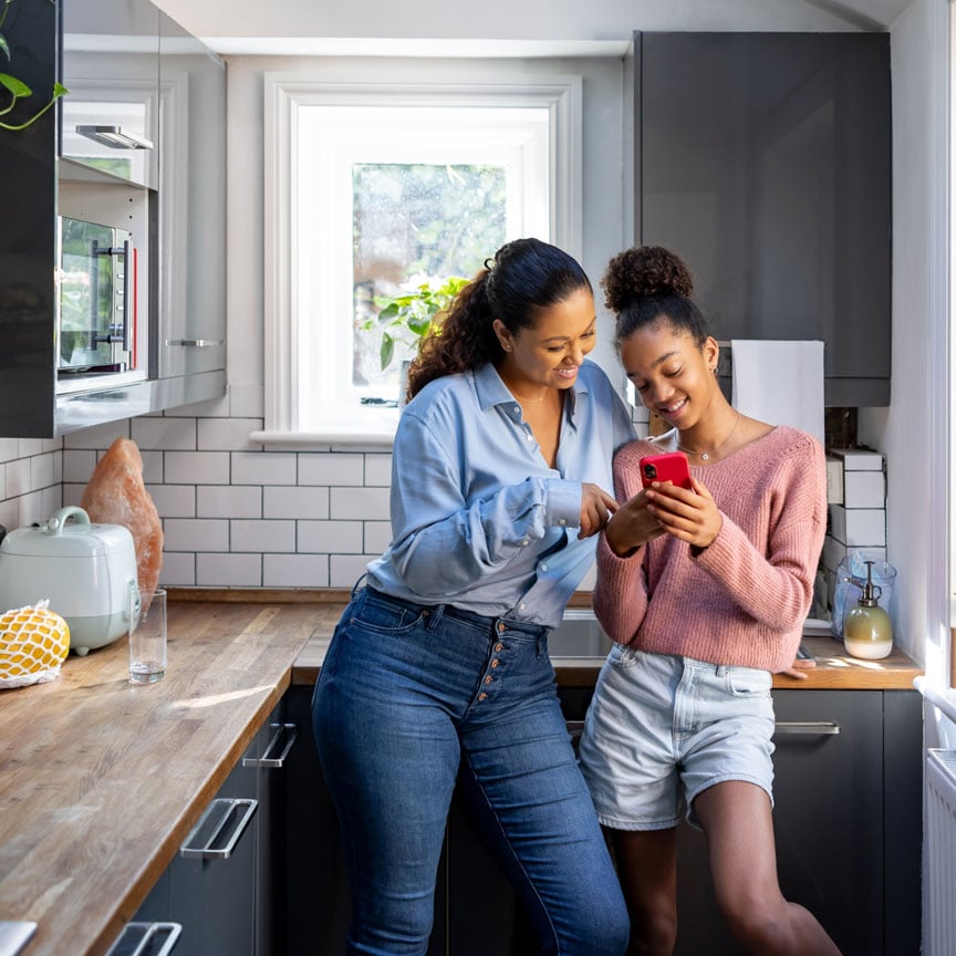 mom and daughter in kitchen