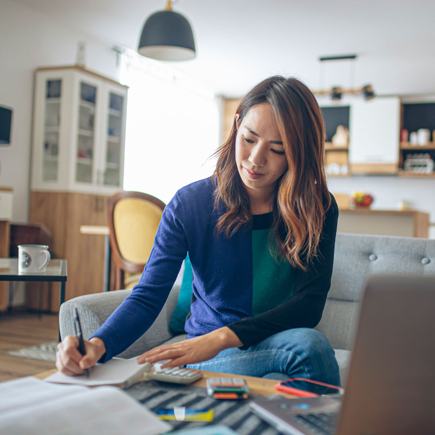 woman calculating expenses