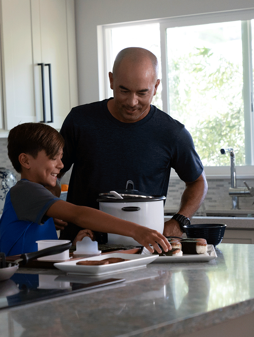 father and son cooking