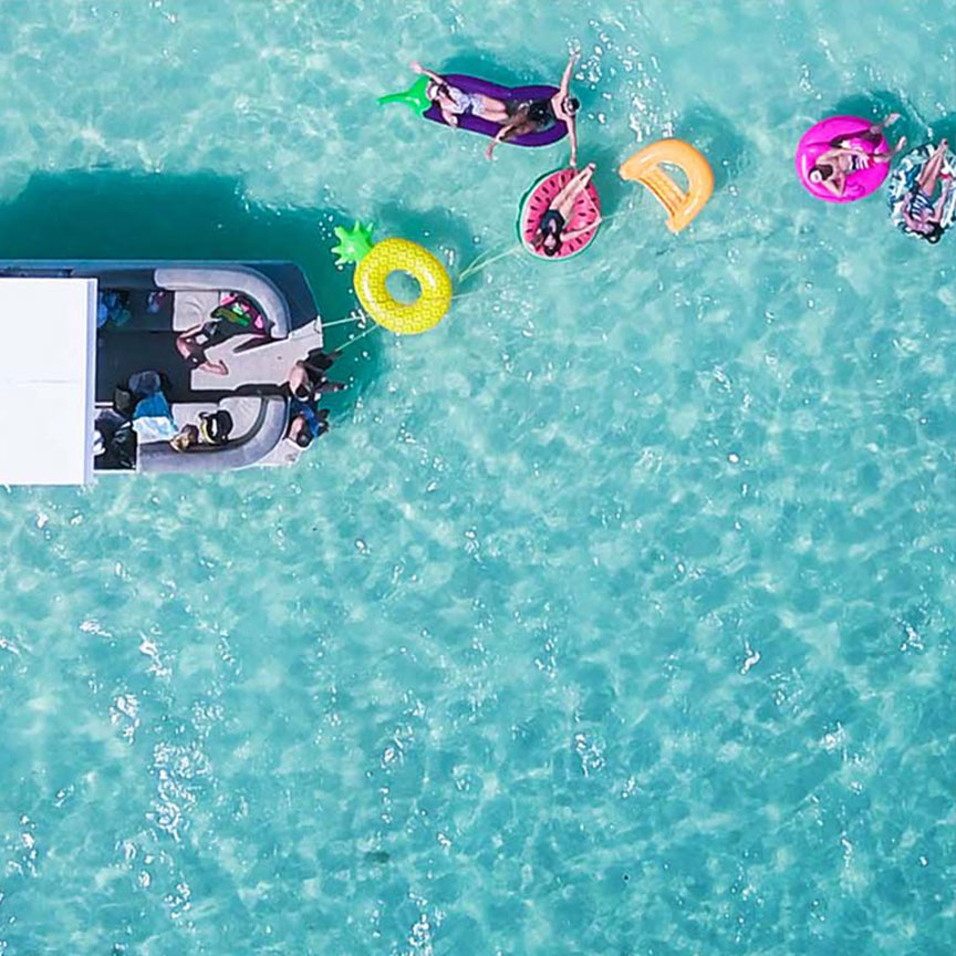 Aerial view of boat and people in water