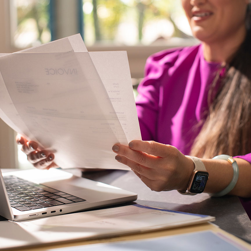 woman looking through documents