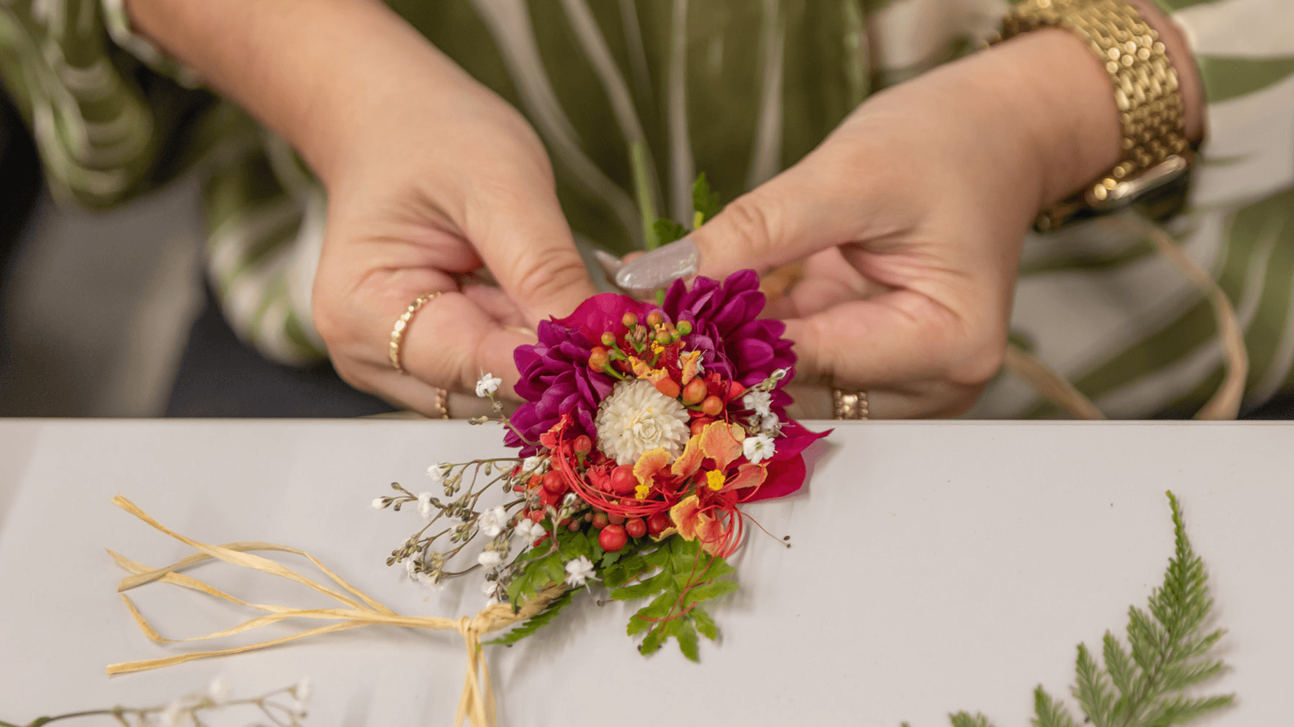 Woman making lei
