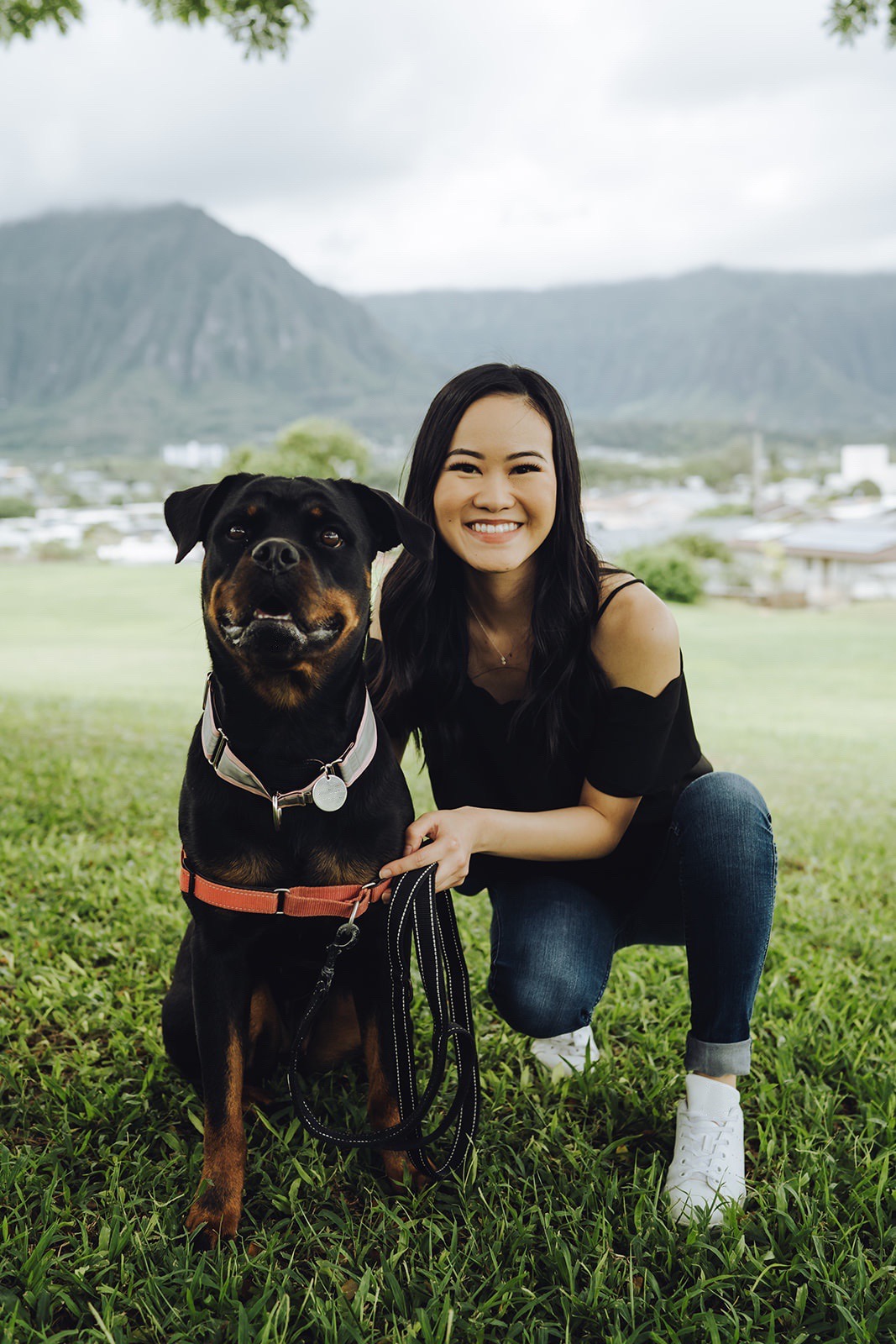 Woman posing with a dog